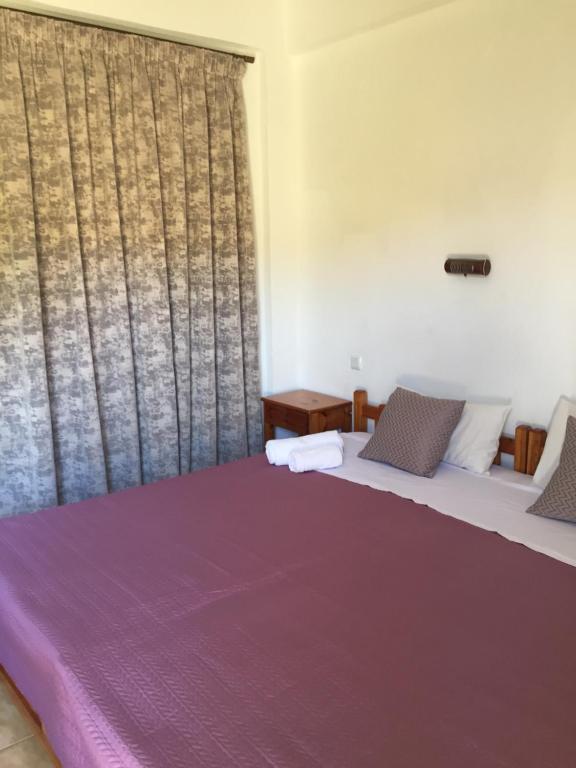Postel nebo postele na pokoji v ubytování Hotel Orama-Matala