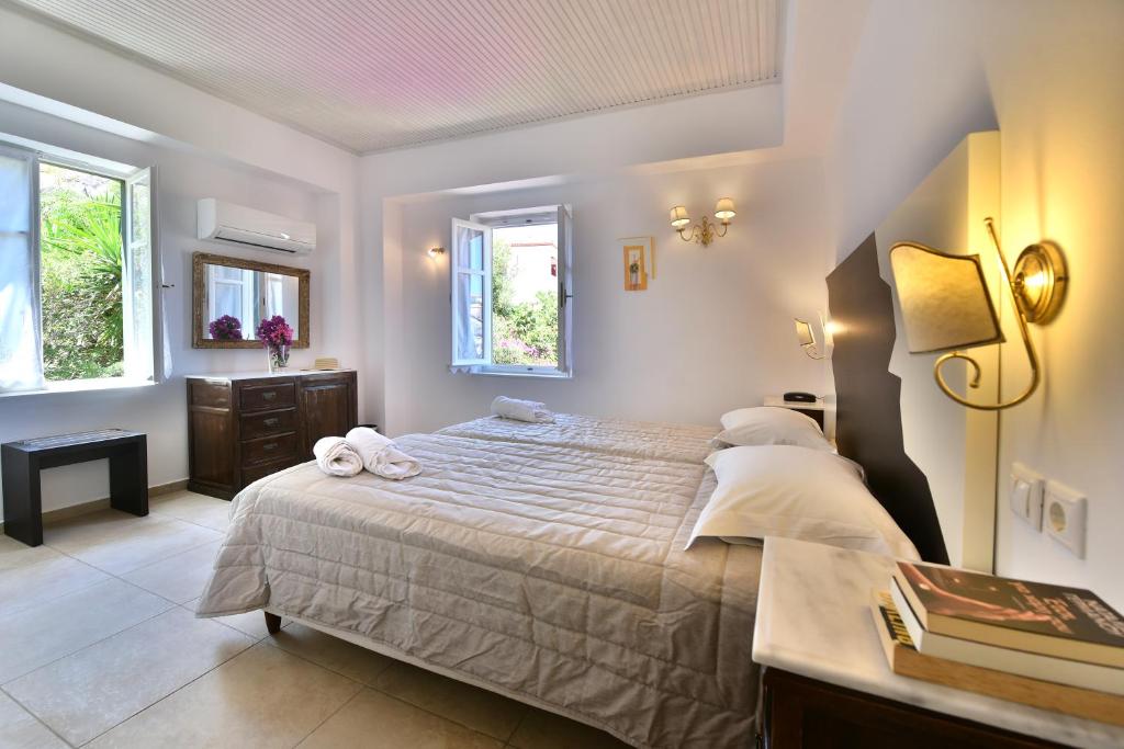 Postel nebo postele na pokoji v ubytování Mistral Hotel