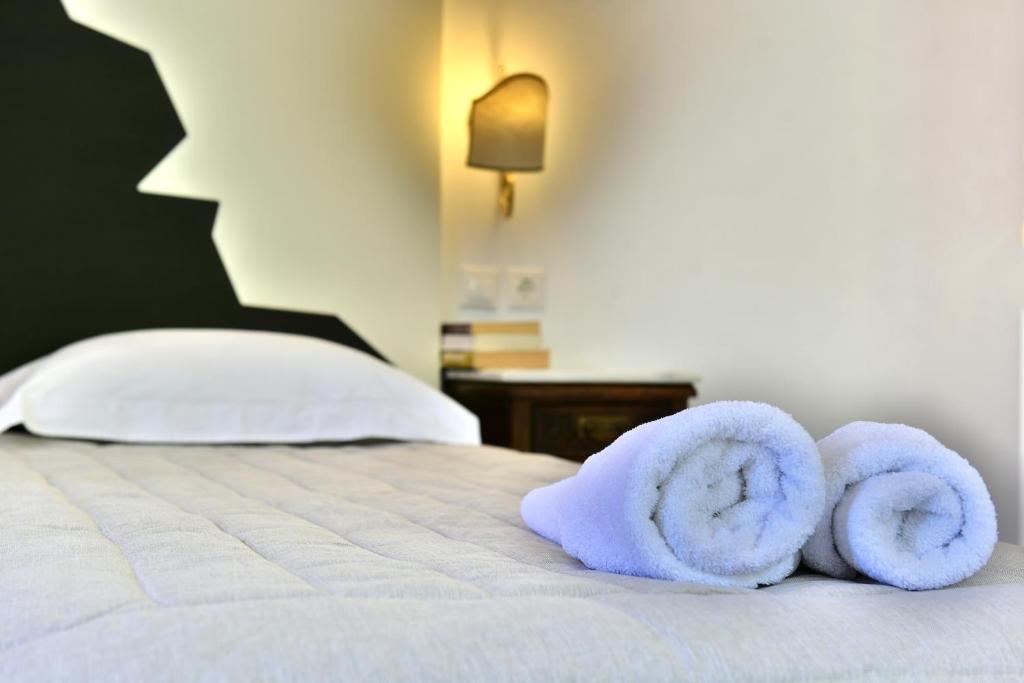 Postel nebo postele na pokoji v ubytování Mistral Hotel