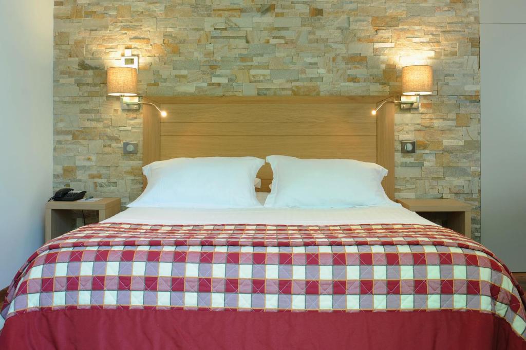 Postel nebo postele na pokoji v ubytování Hotel Argi Eder