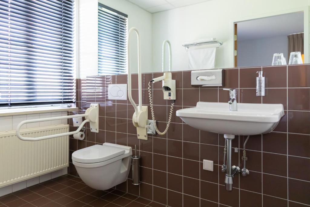 Koupelna v ubytování Fletcher Kloosterhotel Willibrordhaeghe
