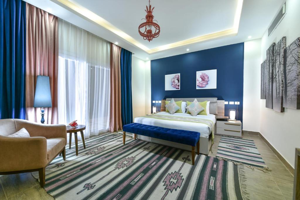 Postel nebo postele na pokoji v ubytování Tolip North Coast Hotel