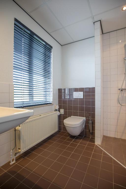 Koupelna v ubytování Fletcher Kloosterhotel Willibrordhaeghe