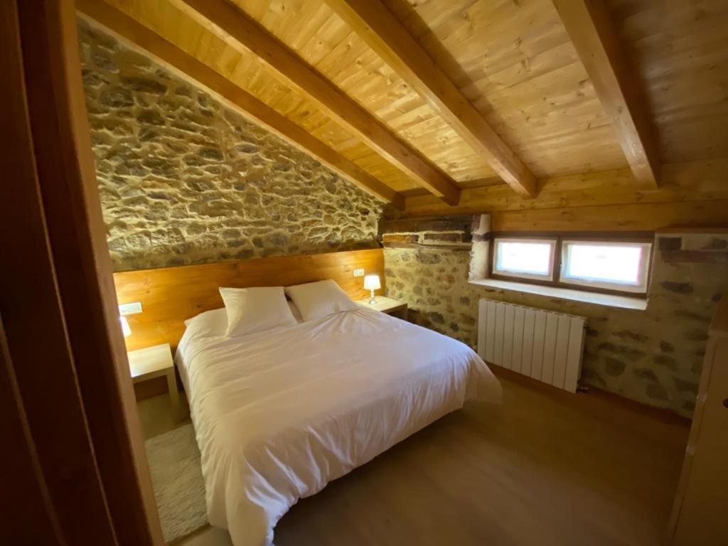 Postel nebo postele na pokoji v ubytování Alojamiento Rural El Molino de Butrera