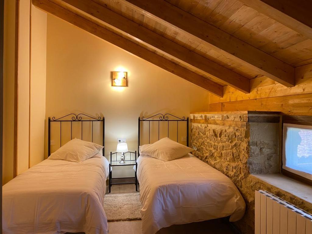Postel nebo postele na pokoji v ubytování Alojamiento Rural El Molino de Butrera