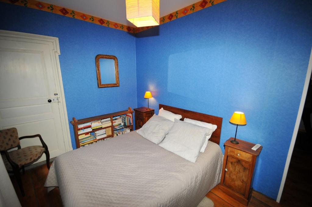 Poste&#x13E; alebo postele v izbe v ubytovan&iacute; Appartement de 2 chambres avec balcon et wifi a La Grave