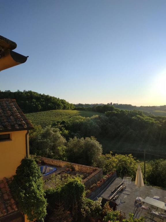 a view from the roof of a house at Poderi in Chianti in Tavarnelle in Val di Pesa
