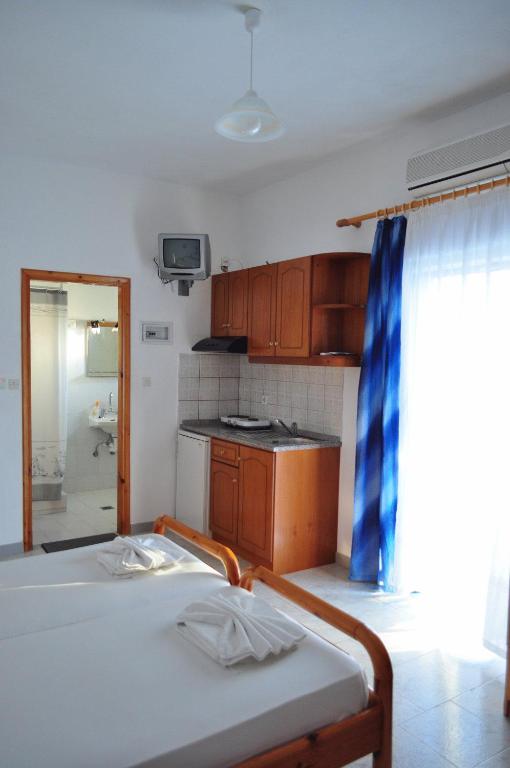 Postel nebo postele na pokoji v ubytování Panorama Hotel