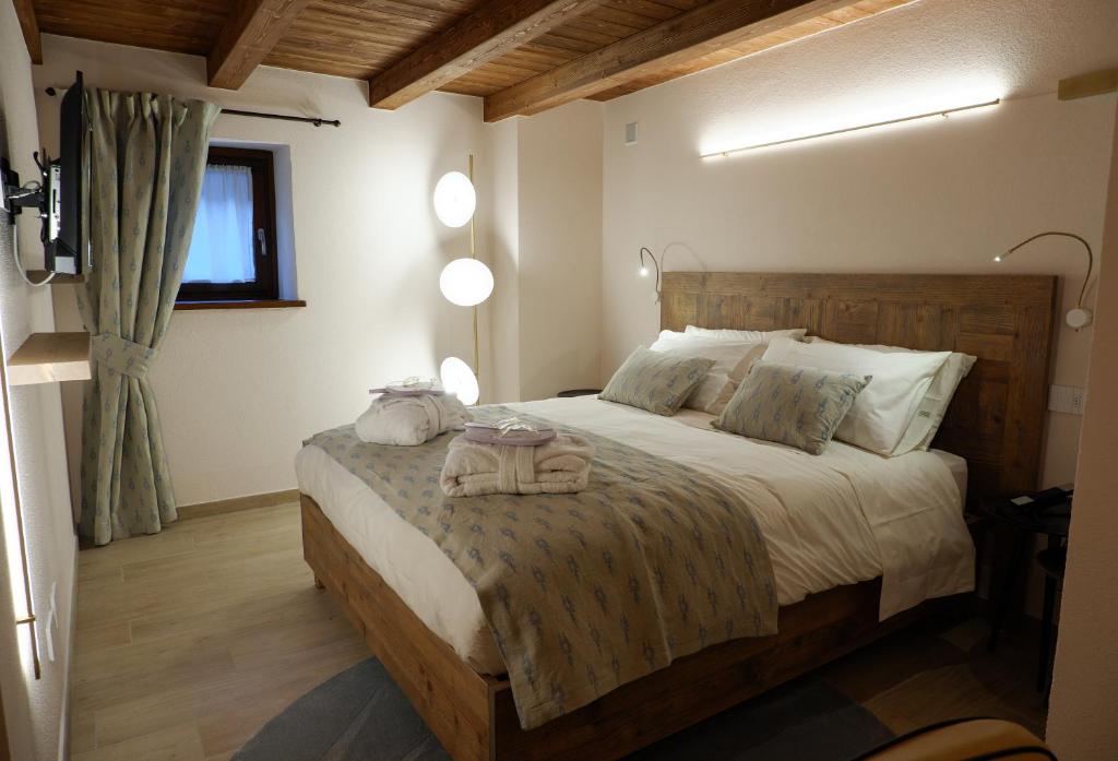 Postel nebo postele na pokoji v ubytování Maison Bertin