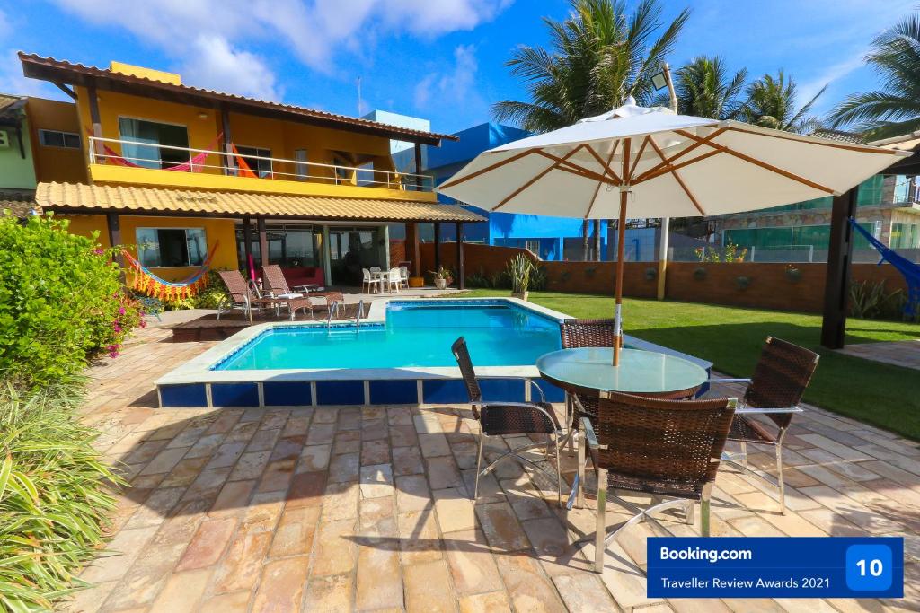  Casa a beira mar com 4 suites e muito conforto