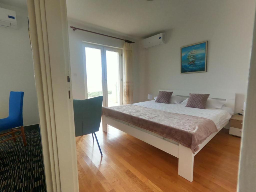 Posteľ alebo postele v izbe v ubytovaní Rooms Jelena