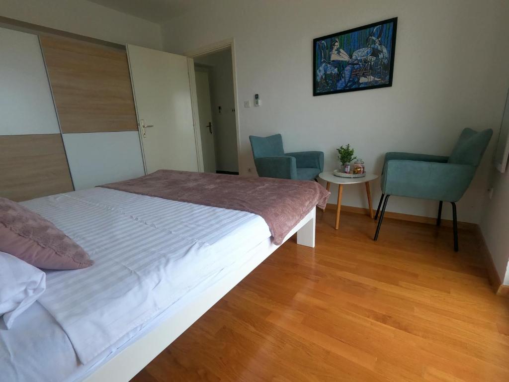 Posteľ alebo postele v izbe v ubytovaní Rooms Jelena
