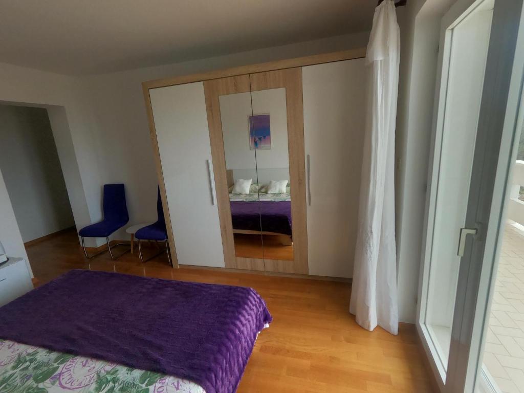 Posteľ alebo postele v izbe v ubytovaní Rooms Jelena