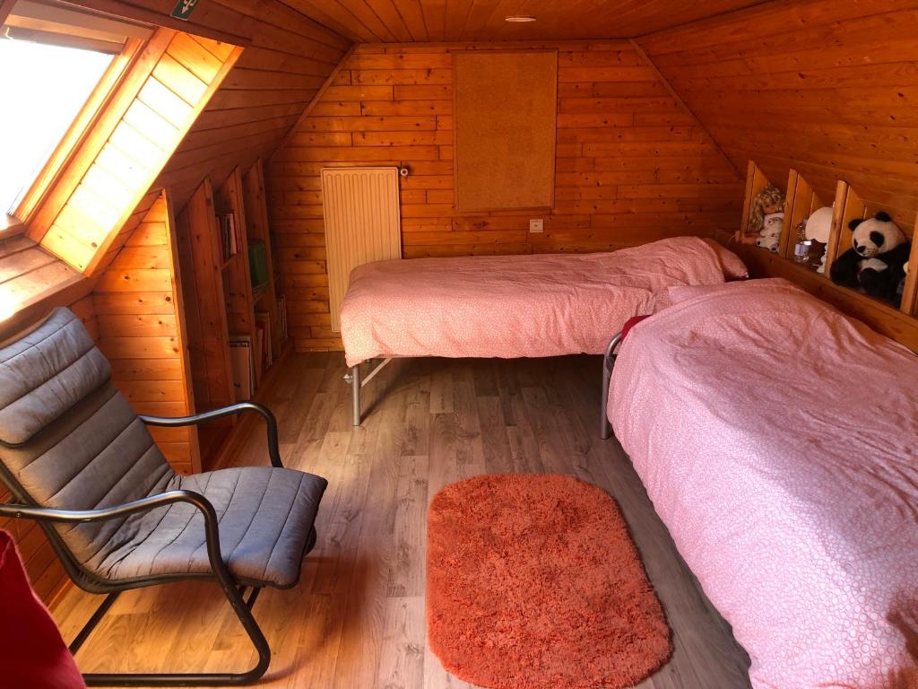 Postel nebo postele na pokoji v ubytování B&B Carisma