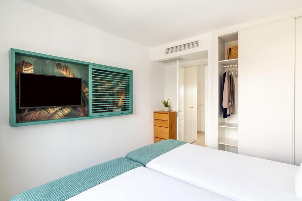 Postel nebo postele na pokoji v ubytování Nazaret Apartments