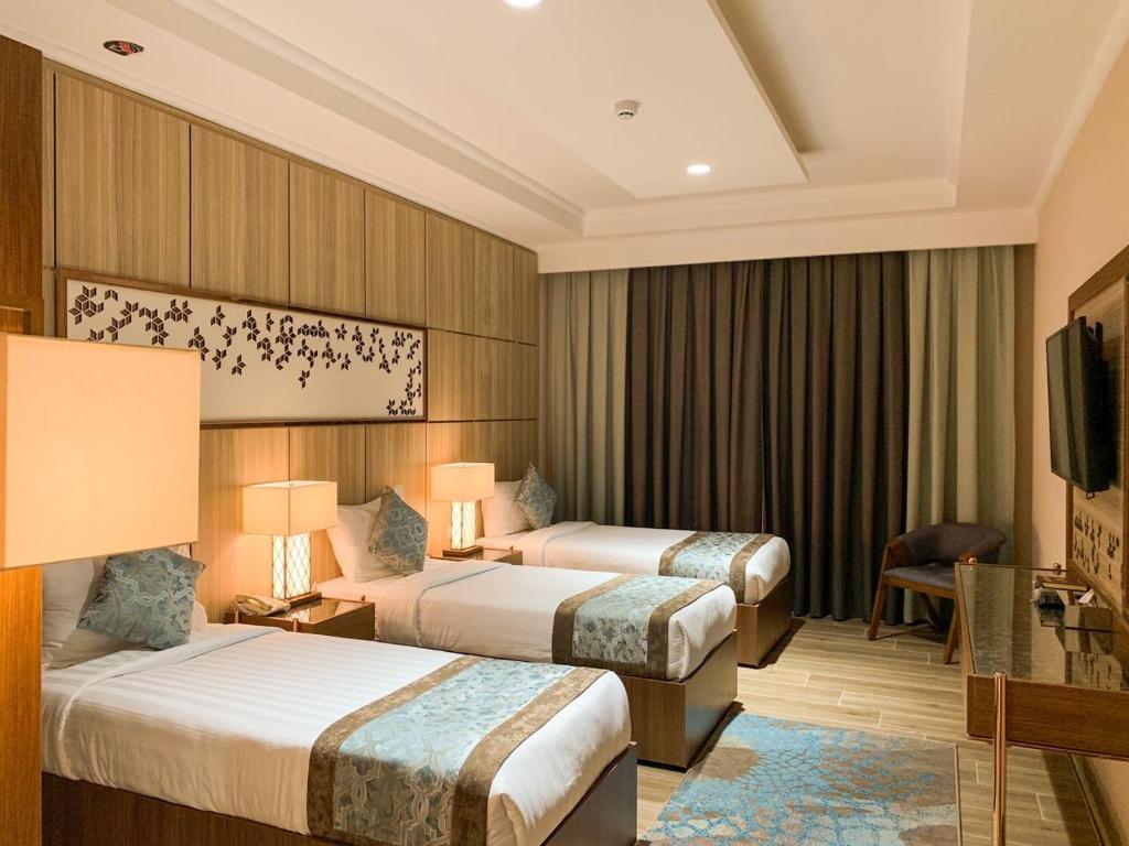 Midan Hotel & Suites Al Aziziya - Dreifacher Raum