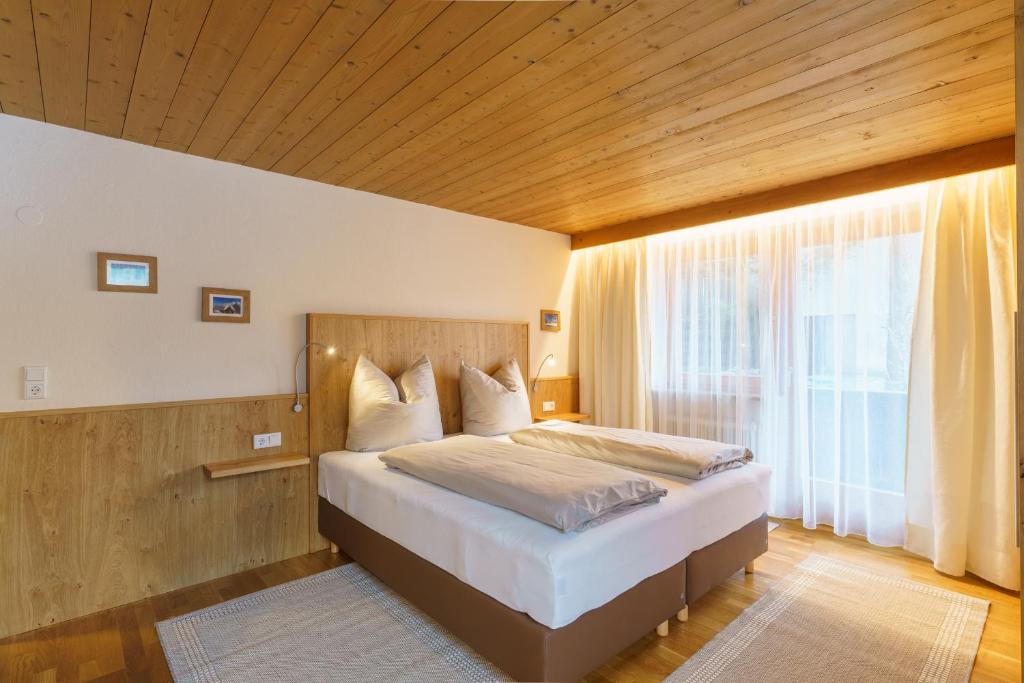 Postel nebo postele na pokoji v ubytování Apartmenthaus Jagdhof
