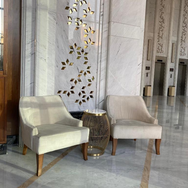 Posezení v ubytování Midan Hotel & Suites Al Aziziya