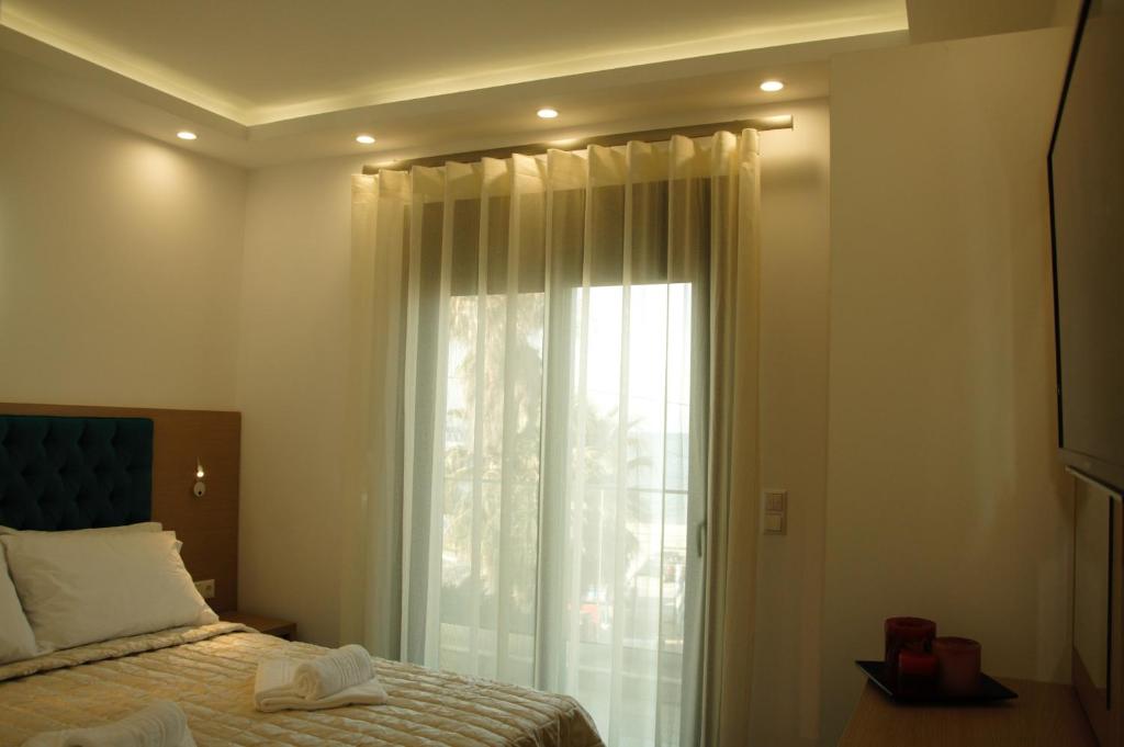 Postel nebo postele na pokoji v ubytování Hotel Medusa