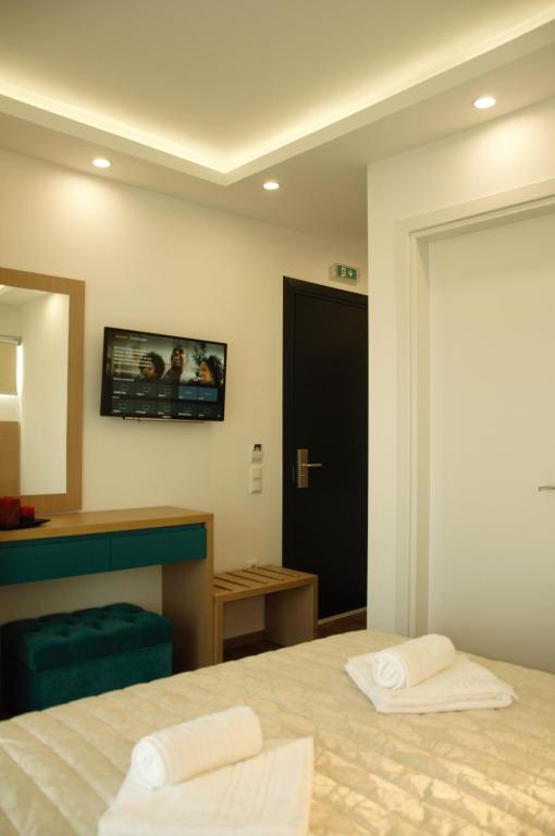 Postel nebo postele na pokoji v ubytování Hotel Medusa