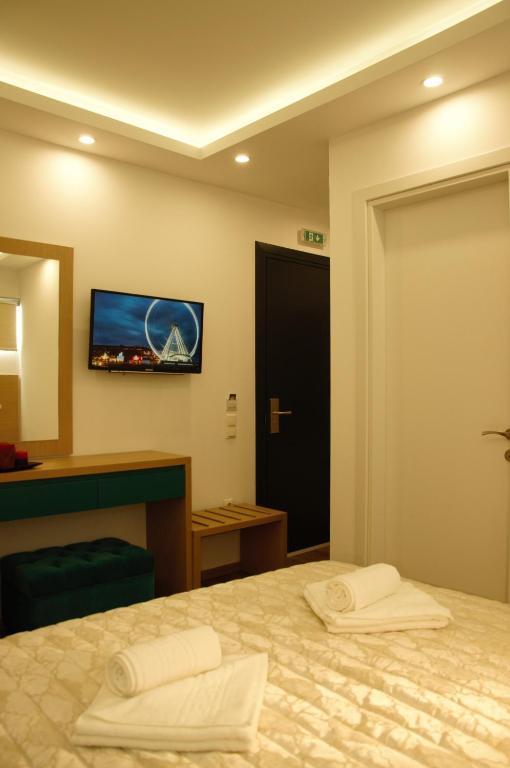 Postel nebo postele na pokoji v ubytování Hotel Medusa
