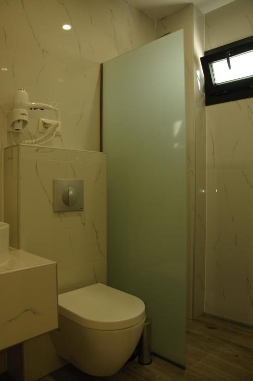 Koupelna v ubytování Hotel Medusa