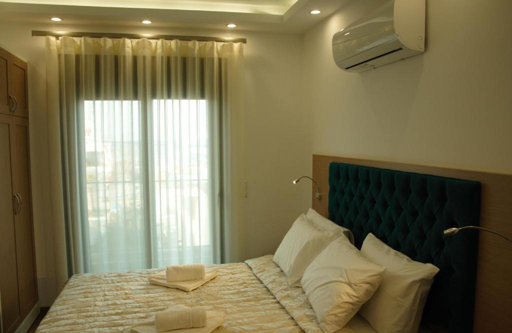 Postel nebo postele na pokoji v ubytování Hotel Medusa