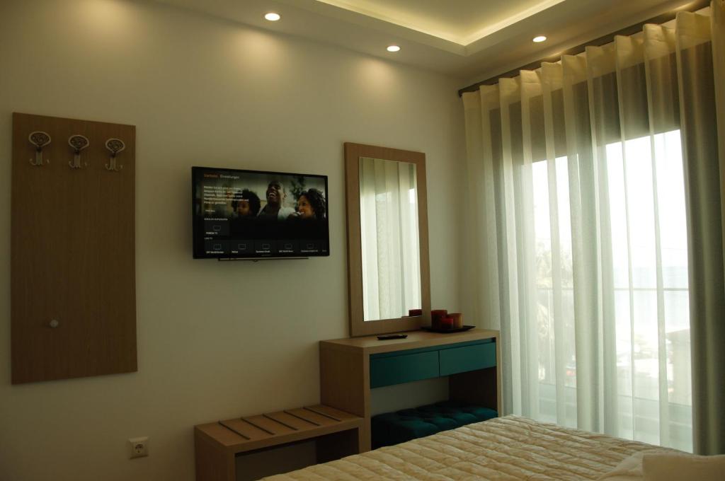 TV a/nebo společenská místnost v ubytování Hotel Medusa