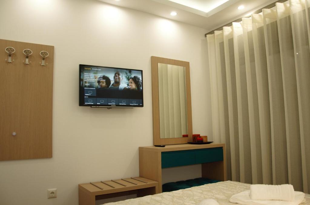 TV a/nebo společenská místnost v ubytování Hotel Medusa
