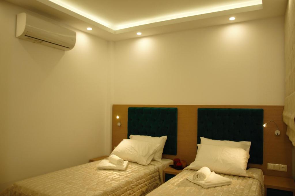 Postel nebo postele na pokoji v ubytování Hotel Medusa