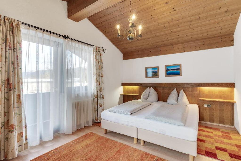 Postel nebo postele na pokoji v ubytování Apartmenthaus Jagdhof