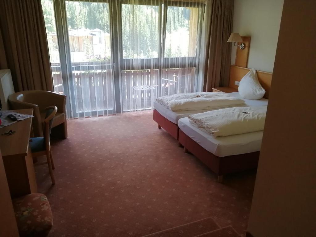 Postel nebo postele na pokoji v ubytování Haus Anni