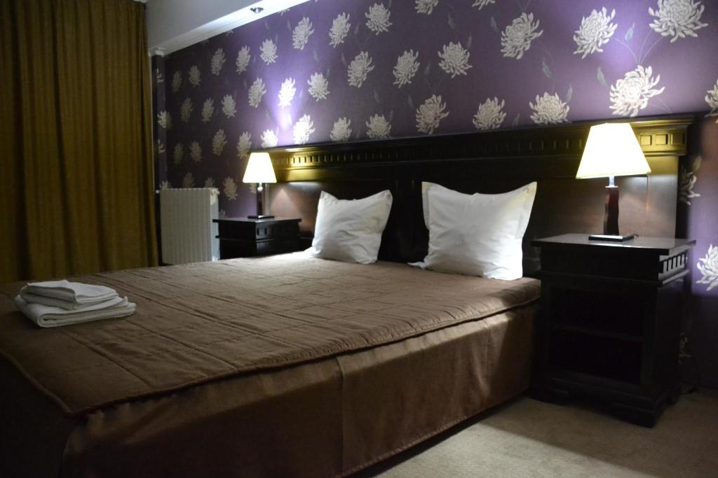 Posteľ alebo postele v izbe v ubytovaní Hotel Condor