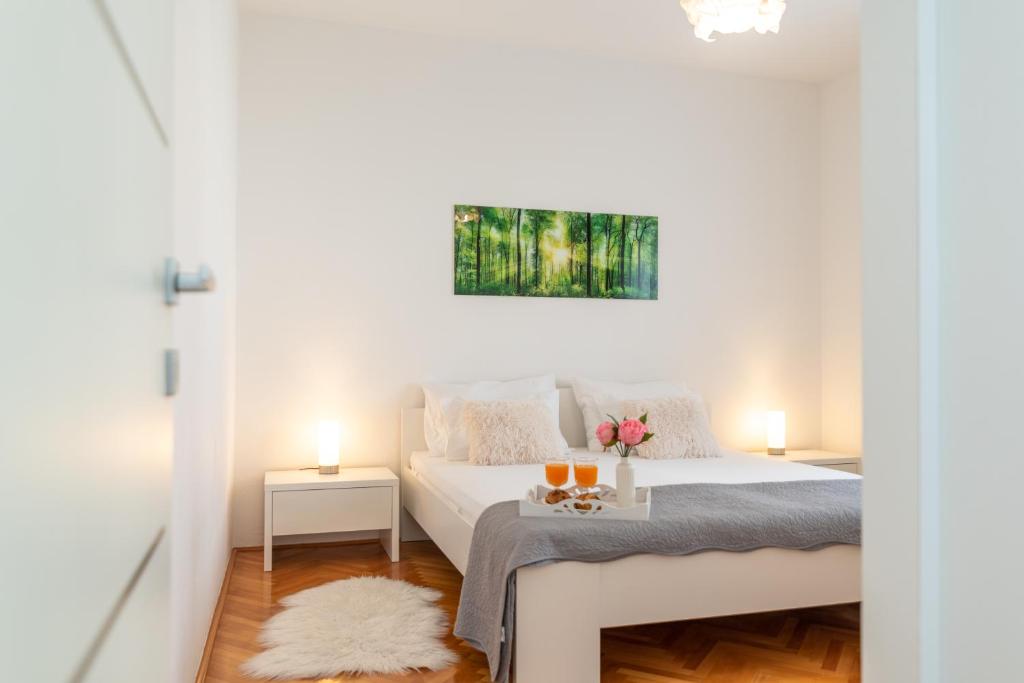Posteľ alebo postele v izbe v ubytovaní Apartman Tragos