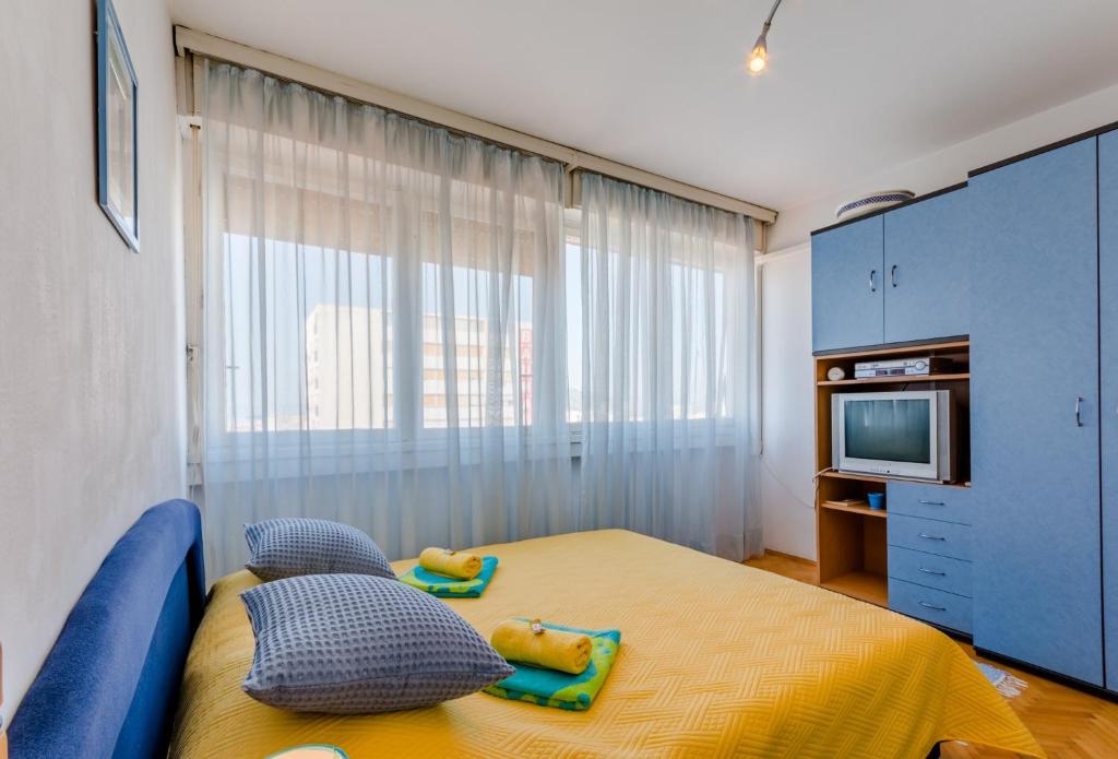 Postel nebo postele na pokoji v ubytování Studio Apartment Ecija