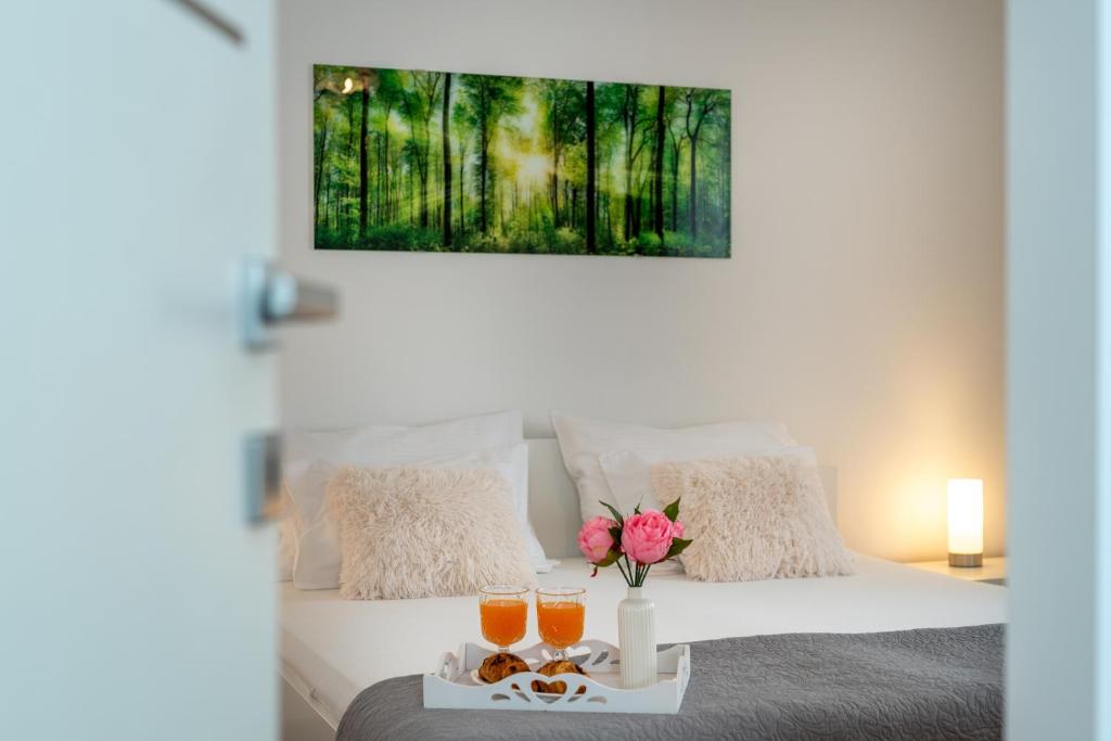 Posteľ alebo postele v izbe v ubytovaní Apartman Tragos