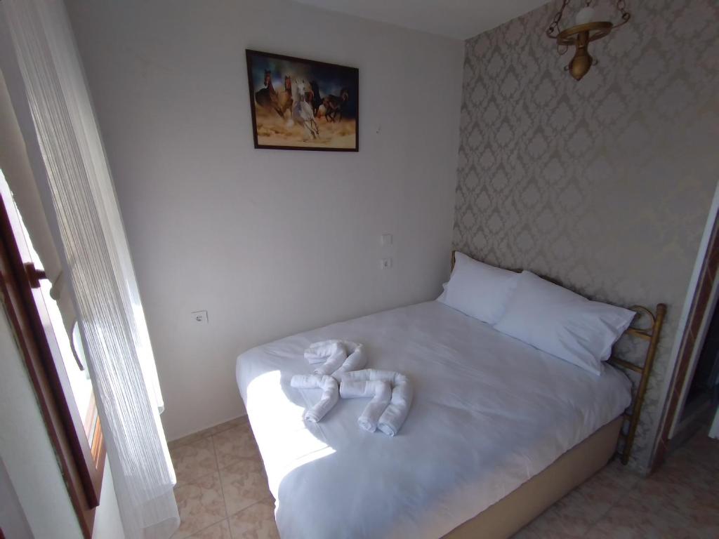Postel nebo postele na pokoji v ubytování Anz Guest House Pansiyon