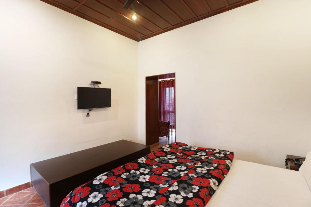Postel nebo postele na pokoji v ubytování Hotel Himalayan Club