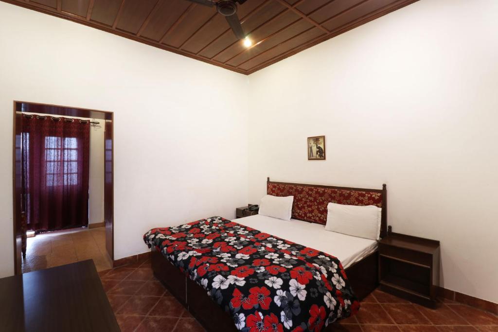 Postel nebo postele na pokoji v ubytování Hotel Himalayan Club