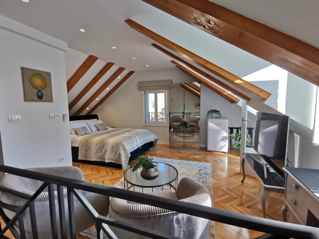 Postel nebo postele na pokoji v ubytování Merla Luxury Rooms