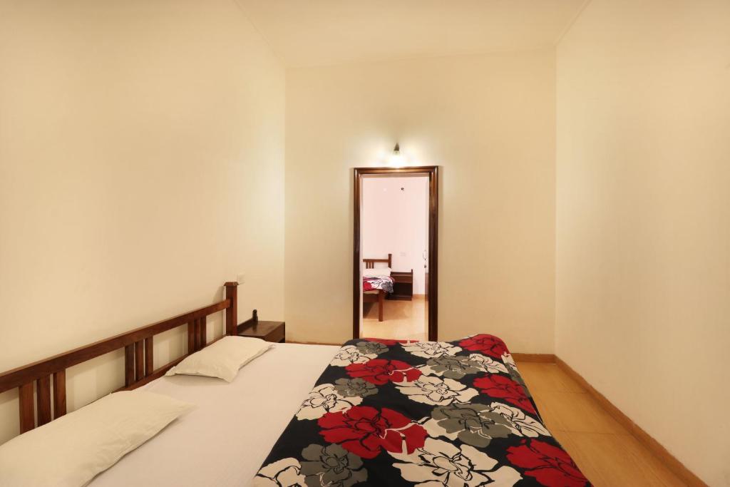 Postel nebo postele na pokoji v ubytování Hotel Himalayan Club