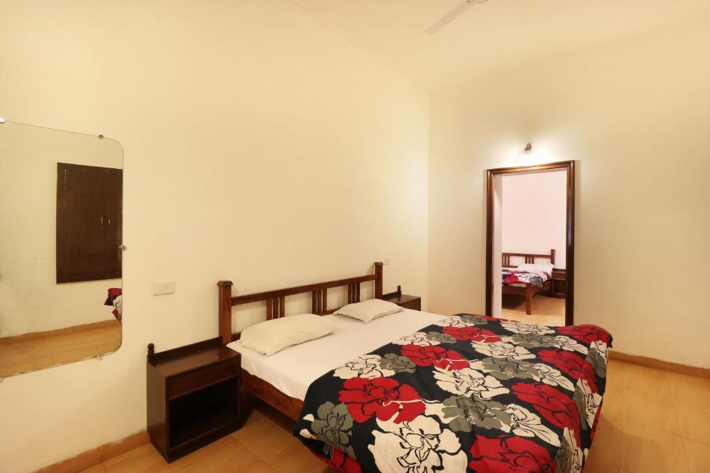 Postel nebo postele na pokoji v ubytování Hotel Himalayan Club