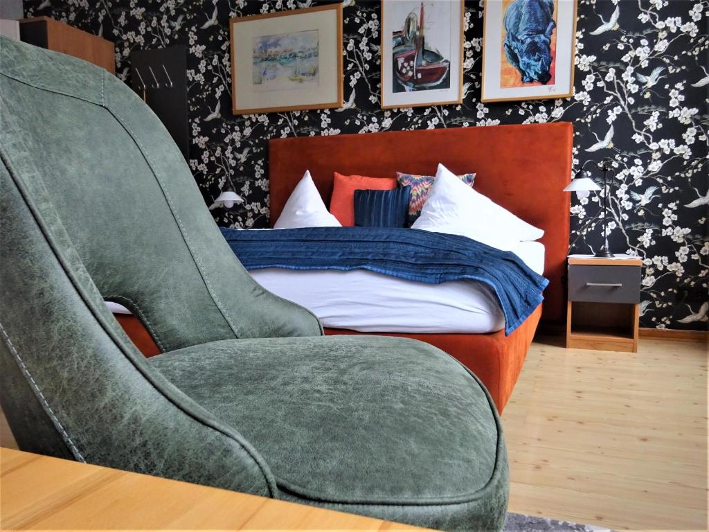 Postel nebo postele na pokoji v ubytování Hotel Pension Zur Fährbrücke