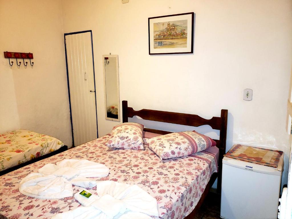 Postel nebo postele na pokoji v ubytování Pousada Recanto dos Nativo