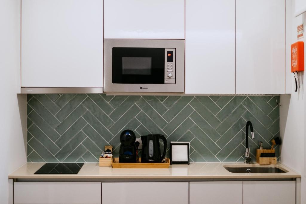 A cozinha ou cozinha compacta de Villa Teresa apartamentos