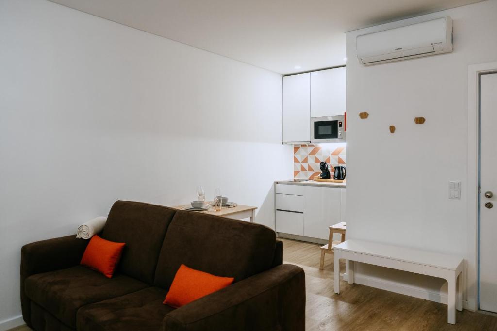 Uma área de estar em Villa Teresa apartamentos