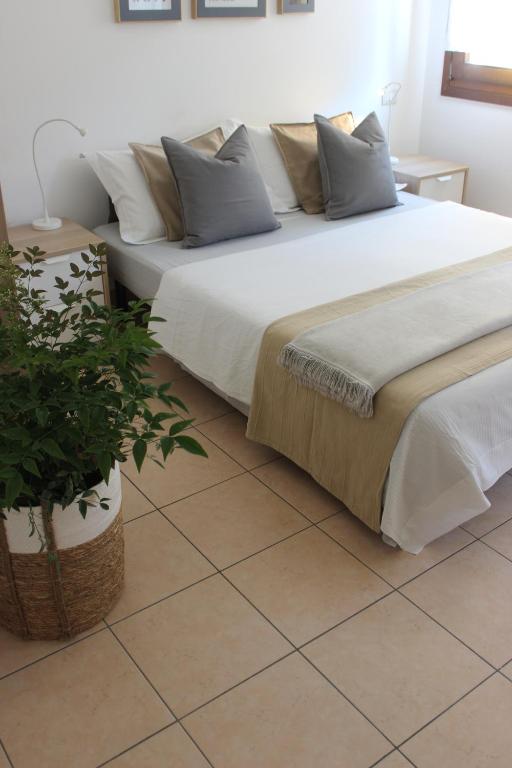 Posteľ alebo postele v izbe v ubytovaní Casa Vacanze Giorgetta 2-3 piano