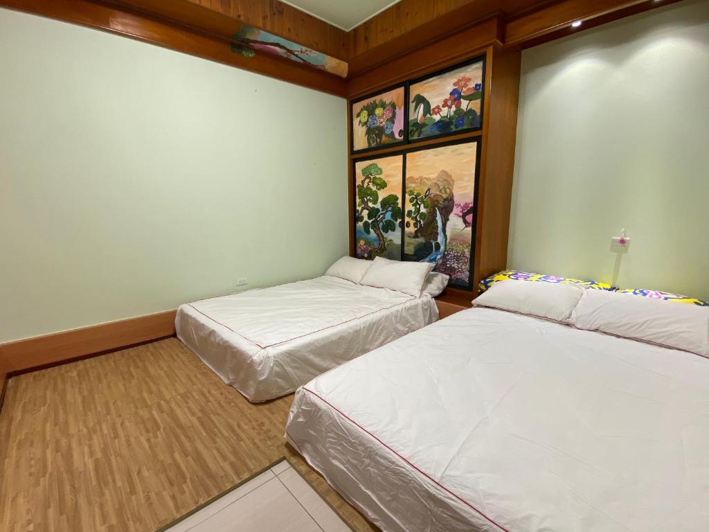 Postel nebo postele na pokoji v ubytování Bridgeside Homestay