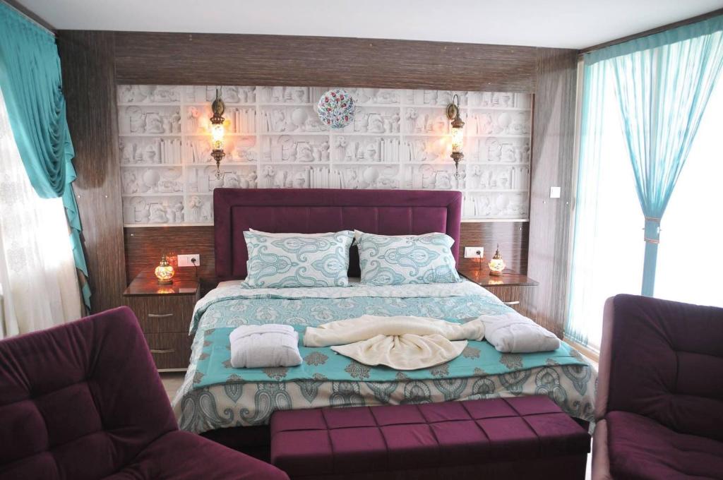 Postel nebo postele na pokoji v ubytování Hotel Goreme Sakura