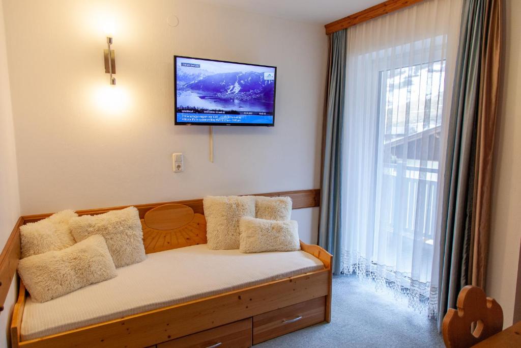 Postel nebo postele na pokoji v ubytování Appartement Gimpl